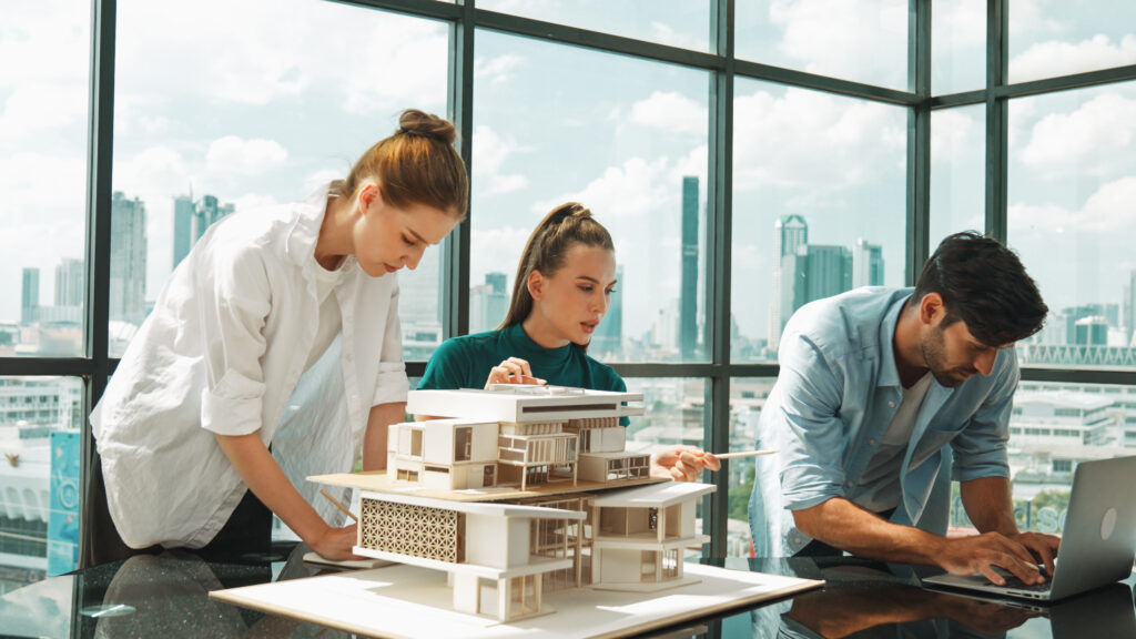 The current image has no alternative text. The file name is: skilled-architect-discussion-with-engineer-team-while-using-laptop-disputation-scaled.jpg